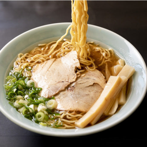 Finishing and plating the ramen